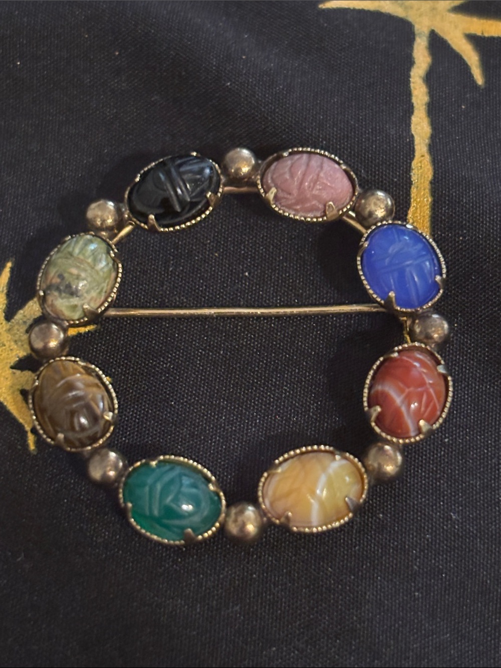 This is a vintage Egyptian Revival scarab brooch